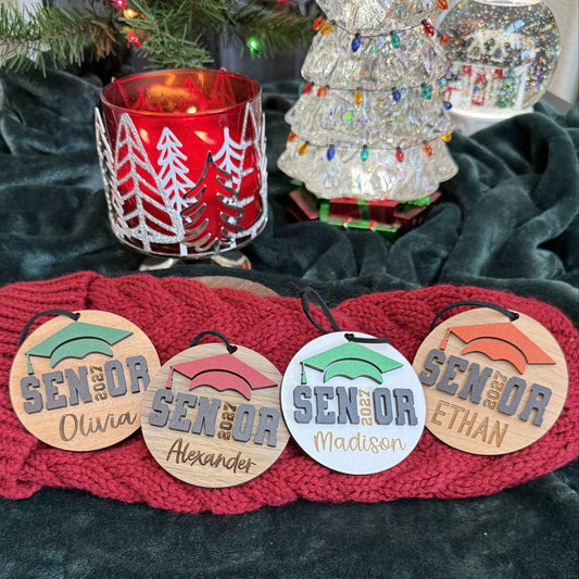 Senior 2027 ornaments in walnut, mahogany, white and cherry finish