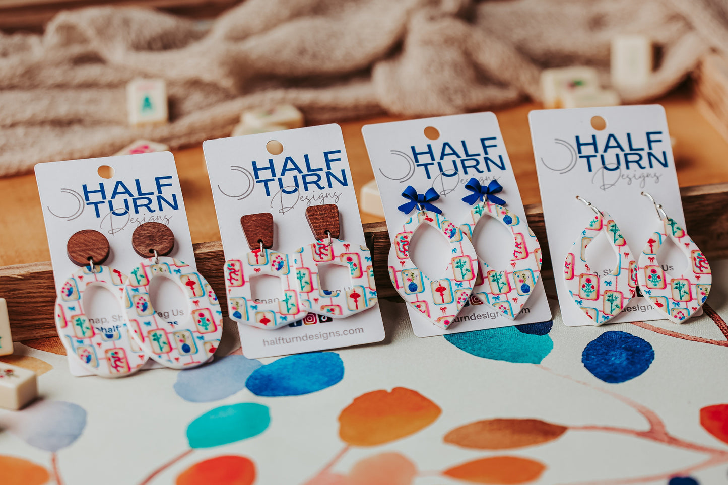 Half Turn Design's collection of colorful mahjong tile hexagon earrings made from lightweight printed acrylic by Half Turn Designs