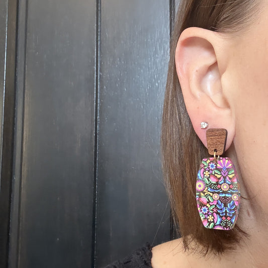 Model wearing Colorful floral acrylic dangle earrings with walnut wood studs