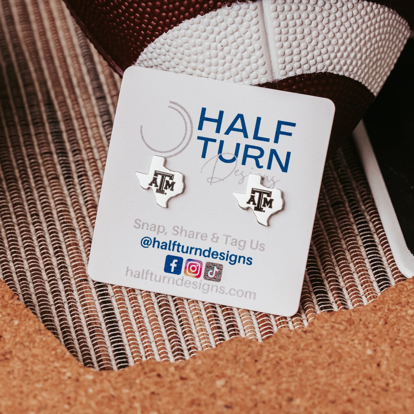 Petite Texas A&M Studs made from stainless steel in gold or silver finish featuring the TAMU logo.