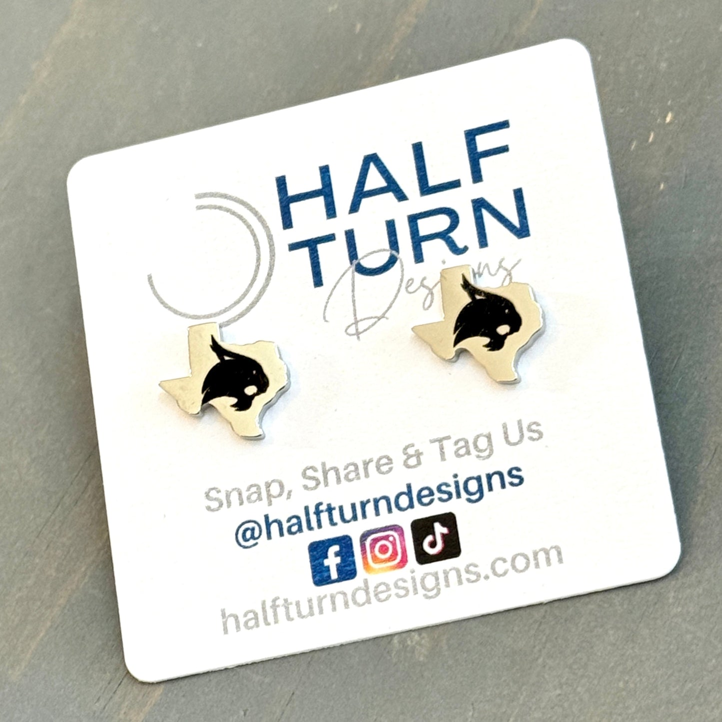 Officially licensed Texas State University Bobcat studs made from hypoallergenic stainless steel in silver finish by Half Turn Designs.