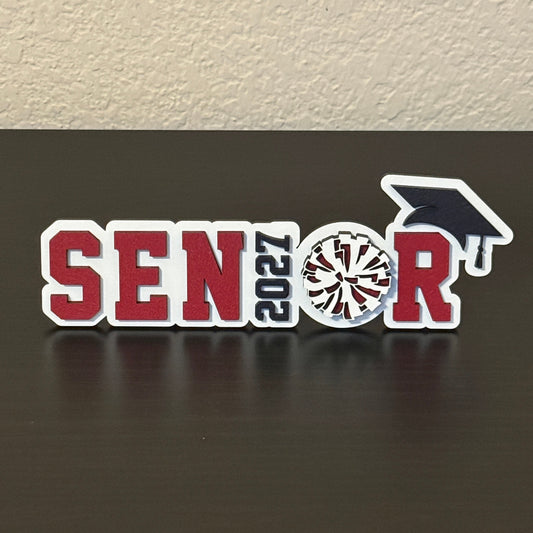 Class of 2027 cheerleader, pom dance squad and drill team sign in white wood with dark red and black accents.