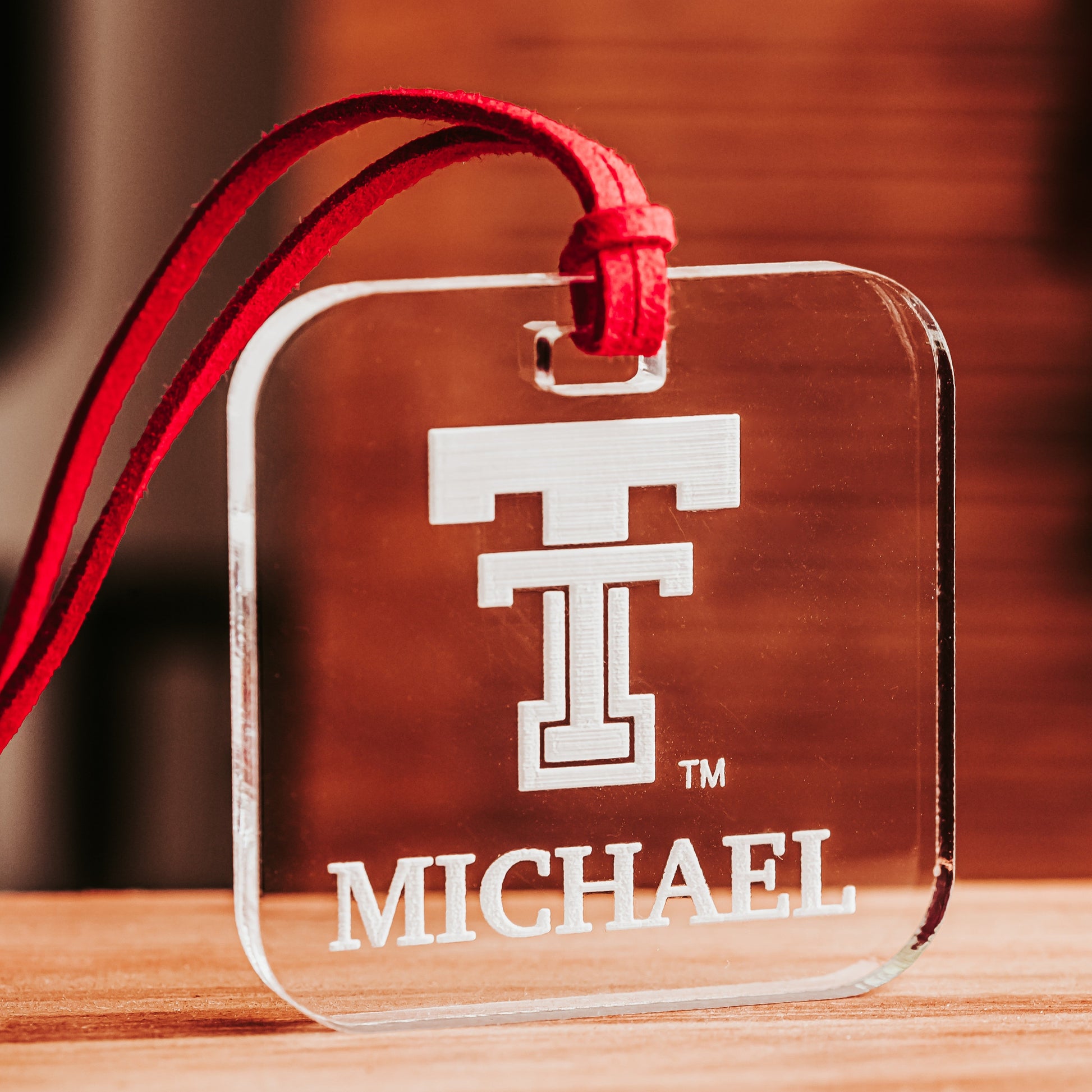 Personalized clear acrylic Texas Tech luggage tag with Double T logo and student or alumni name