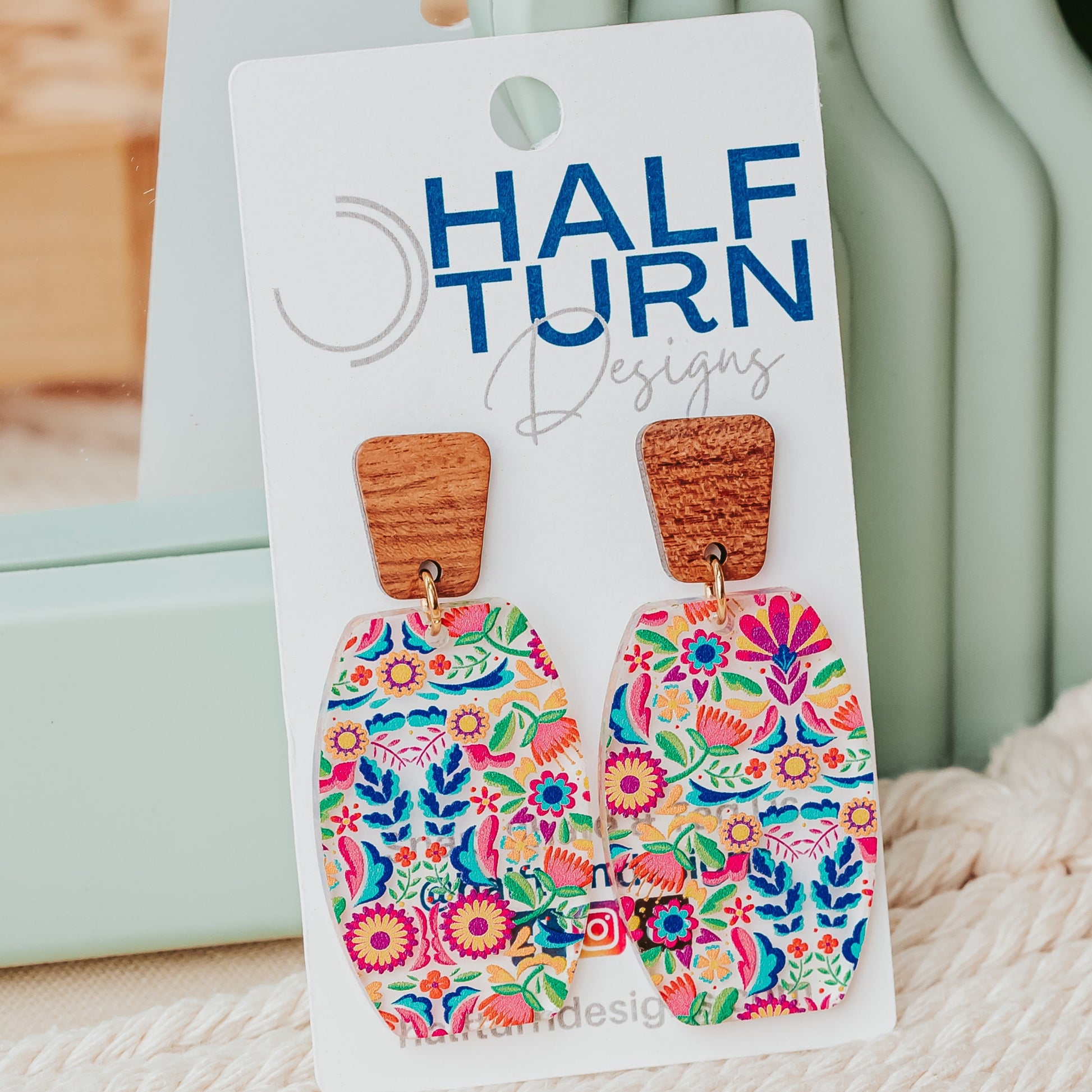 Colorful floral acrylic dangle earrings with walnut wood studs by Half Turn Designs