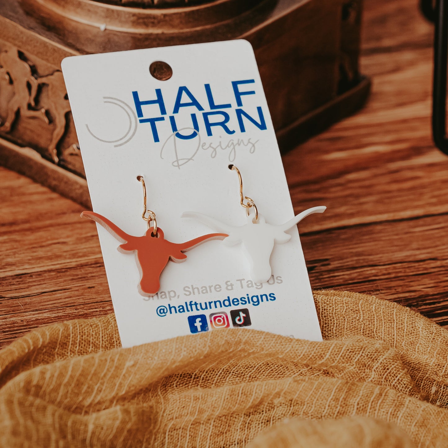 UT Austin burnt orange and white Longhorn dangle earrings