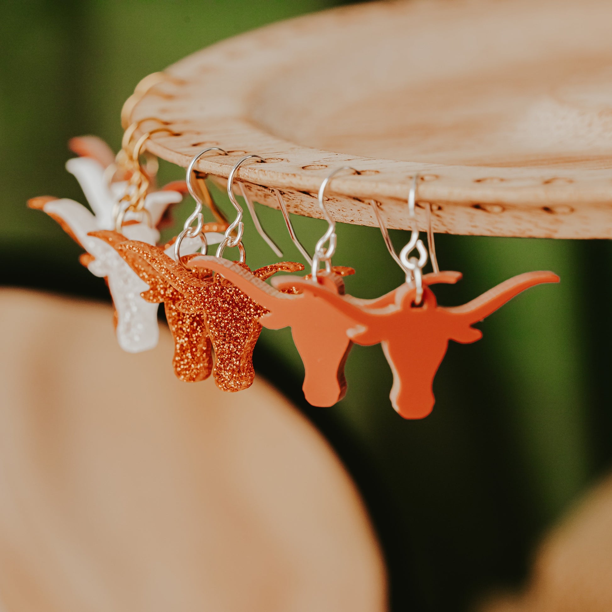 University of Texas burnt orange and white as well as burnt orange glitter and white glitter Longhorn dangle earrings