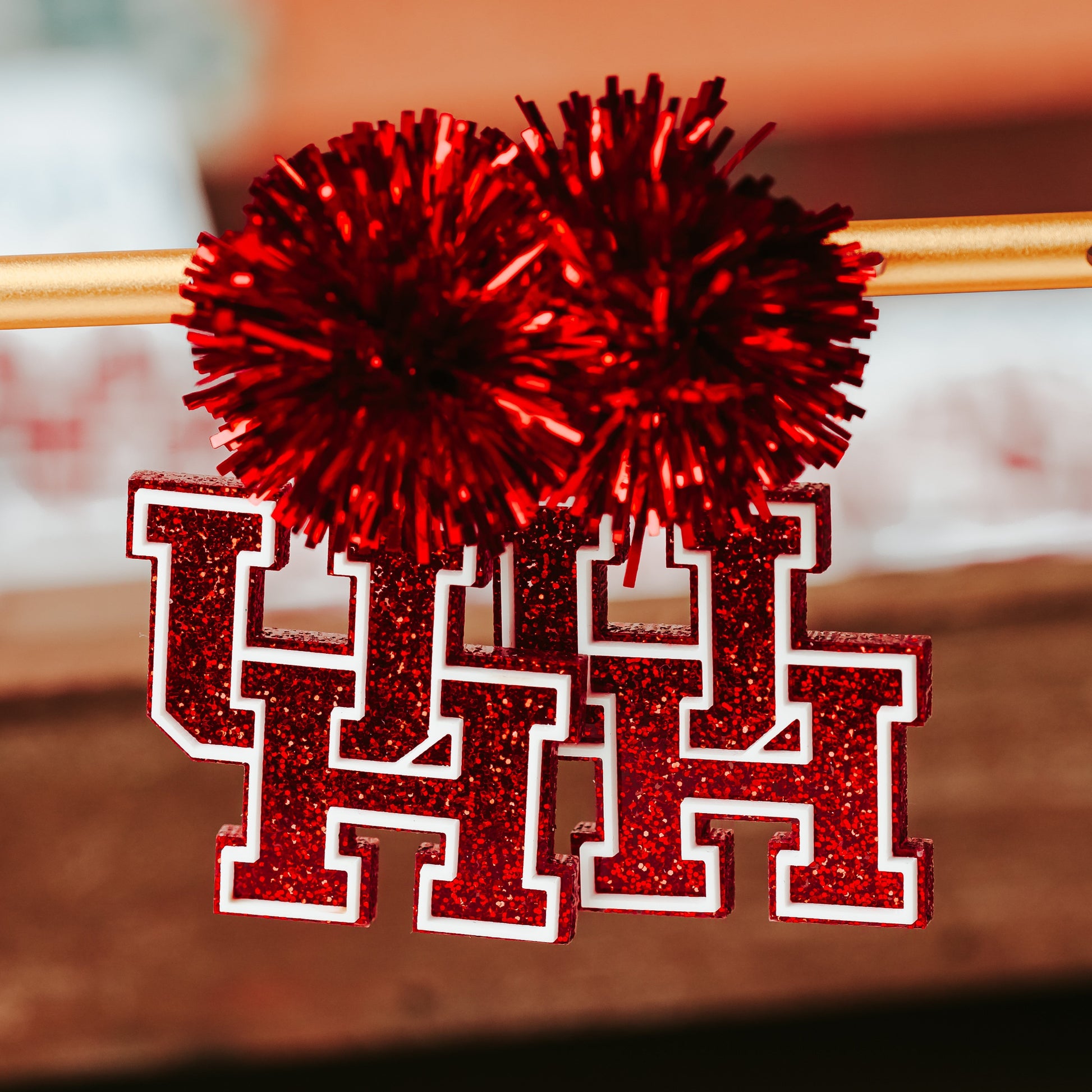 University of Houston red glitter logo dangle acrylic earring with red tinsel topper