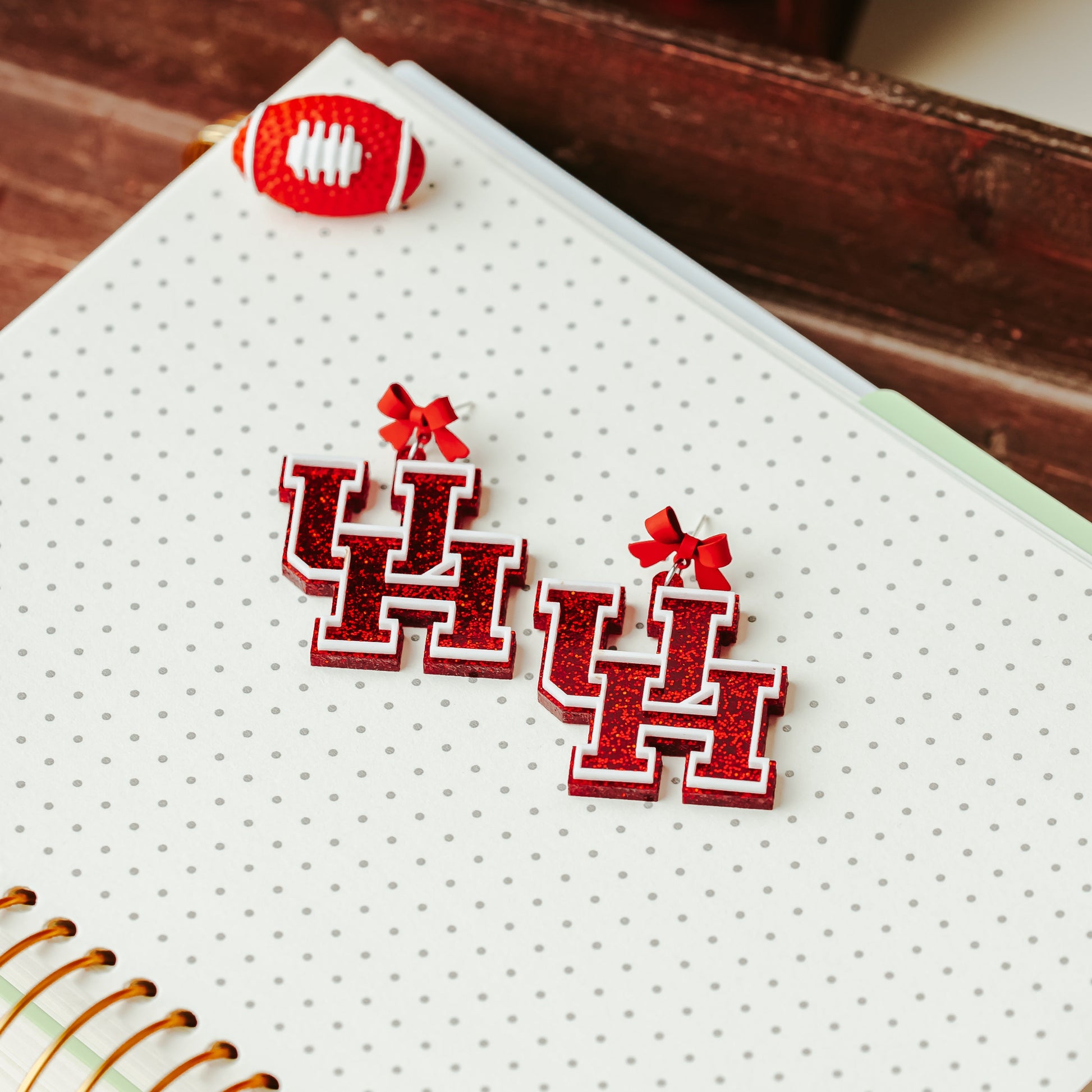 University of Houston red glitter logo dangle acrylic earrings with red bow studs