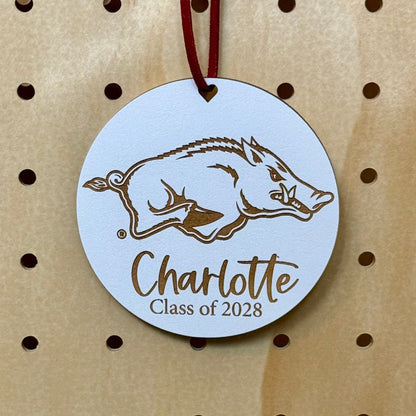 University of Arkansas Razorbacks ornament with UArk  Razorbacks engraved logo and 1-2 lines of personalization. Available in four wood finishes - cherry, mahogany, walnut and white