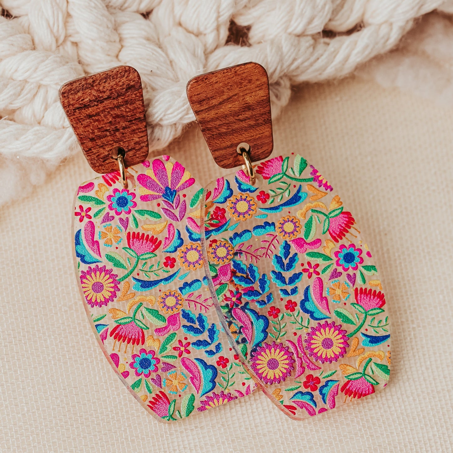 Bright floral statement earrings on wood geometric stud
