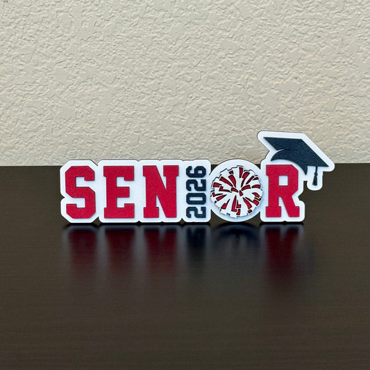 Class of 2026 cheer graduation sign and photo prop by half turn designs. shown here in white wood with red accents