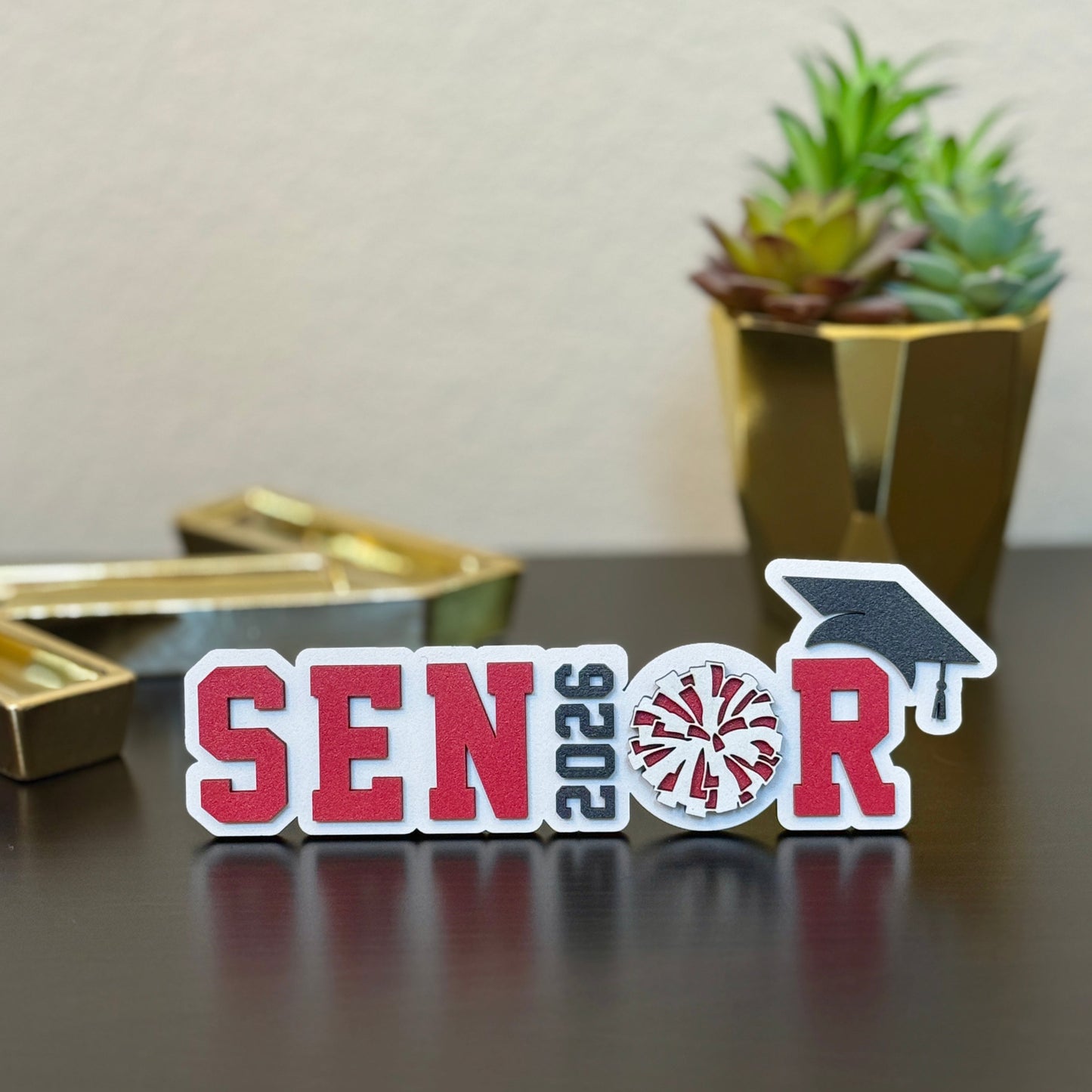 Class of 2026 Dance team senior keepsake sign with pom pom graduation party decoration. Shown here in white with red accents.