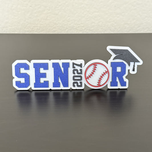 Senior 2027 wood baseball graduation sign with blue and white lettering and baseball detail