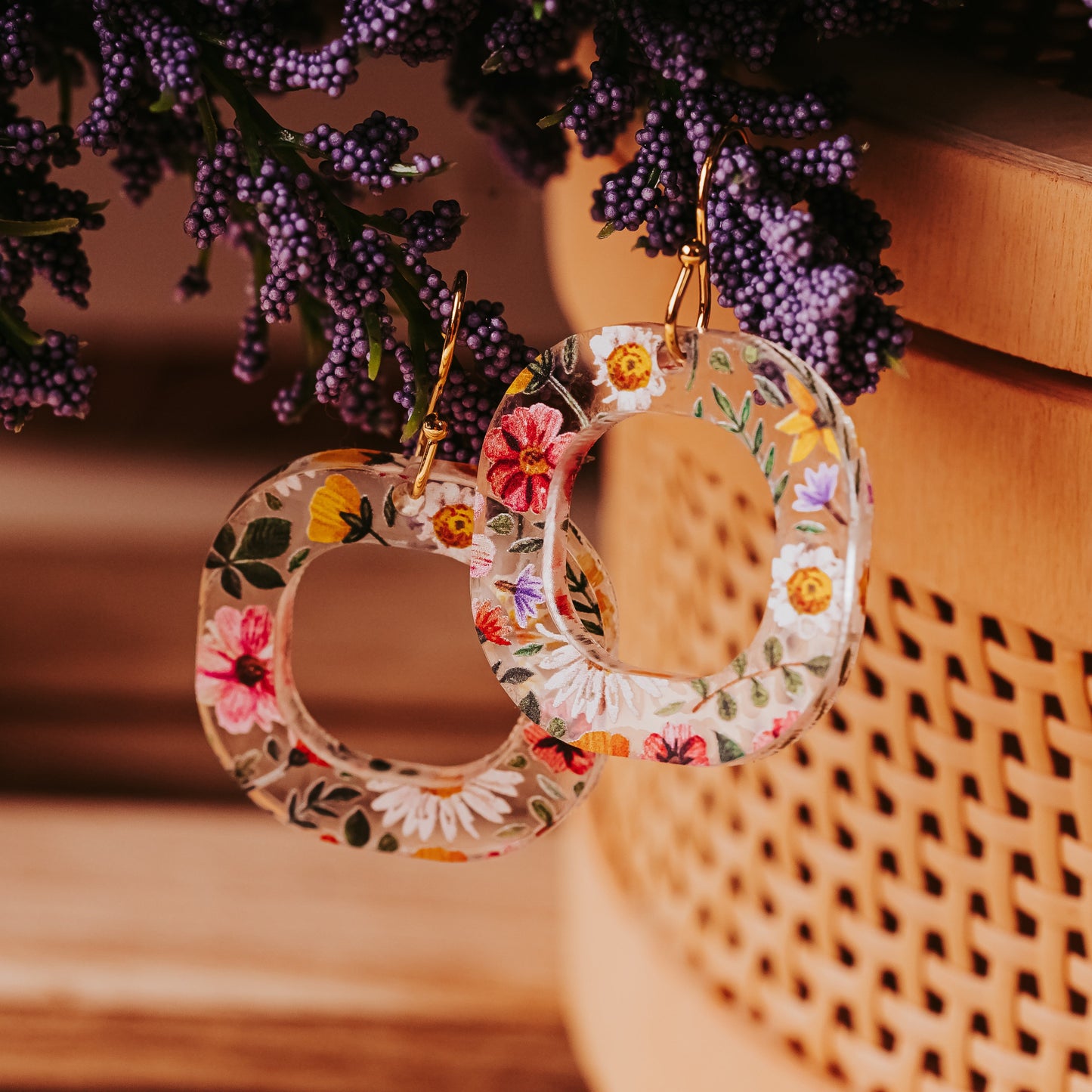 Colorful floral dangle earrings made from  lightweight acrylic with hypoallergenic stainless steel earring hooks in gold tone