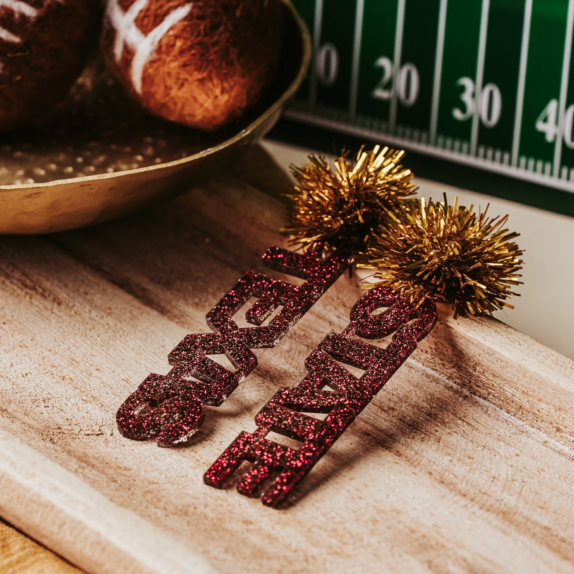 Maroon Texas State earrings for game day, tailgates, and alumni events with gold tinsel topper for game day outfits