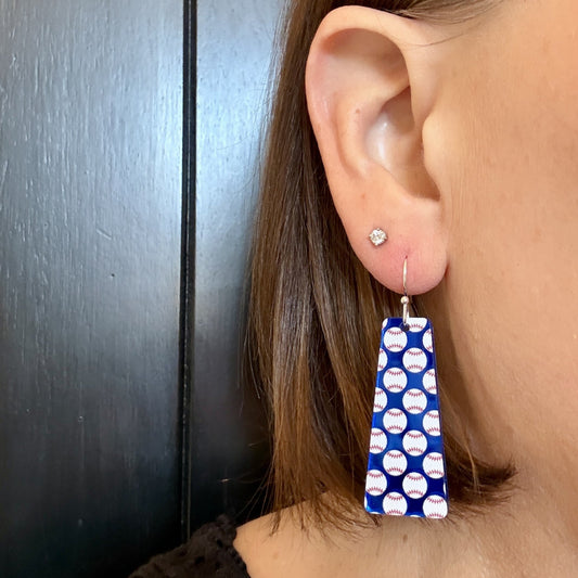 Model wearing Blue mirror baseball bar dangle earrings with silver stainless steel hooks by Half Turn Designs for baseball moms and baseball lovers