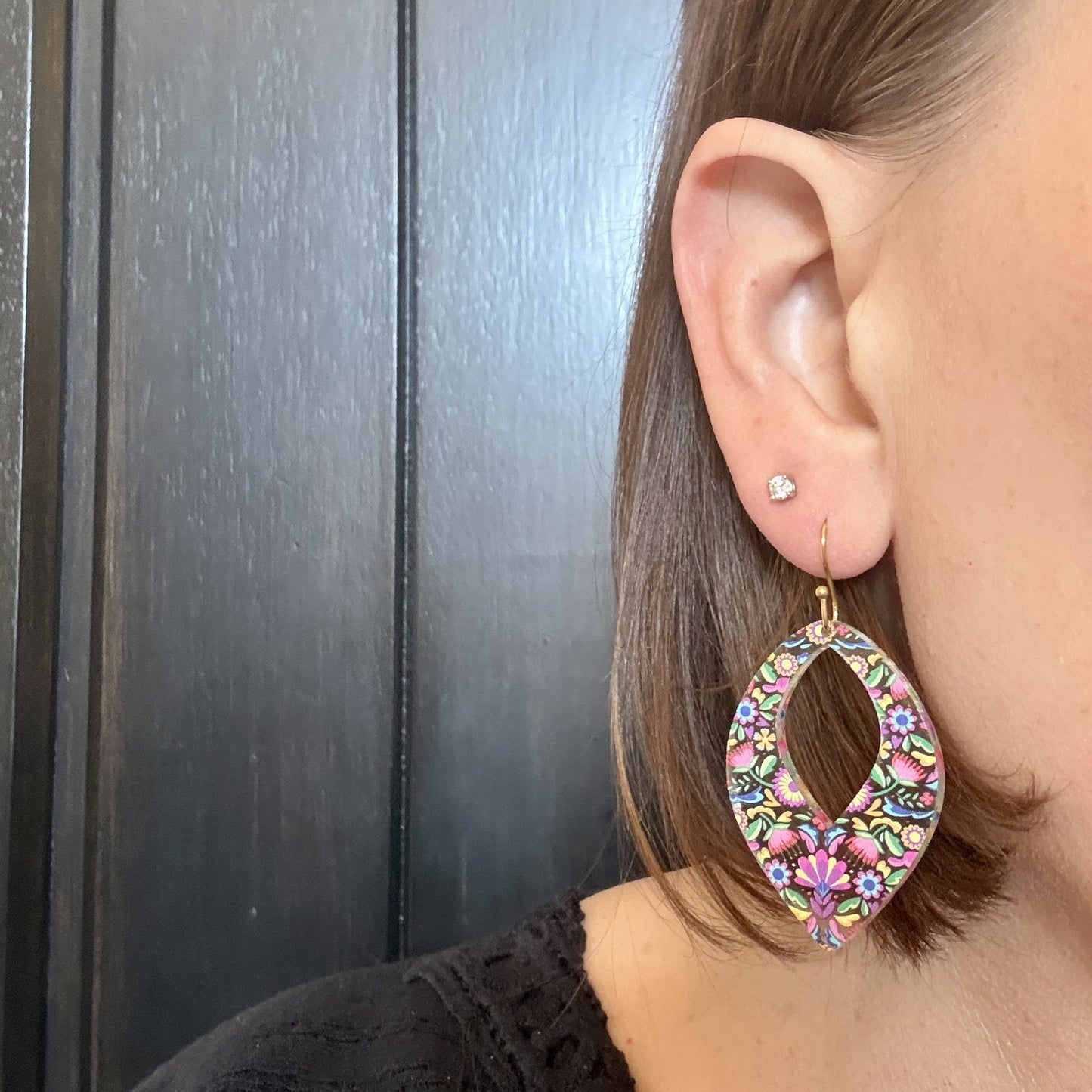 Model wearing bold colorful flower earrings teardrop shape for women summer jewelry with hypoallergenic stainless steel gold earring hooks