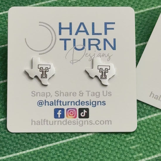 Video of gold and silver-tone Texas-shaped Texas Tech stud earrings engraved with the TTU Double T Logo