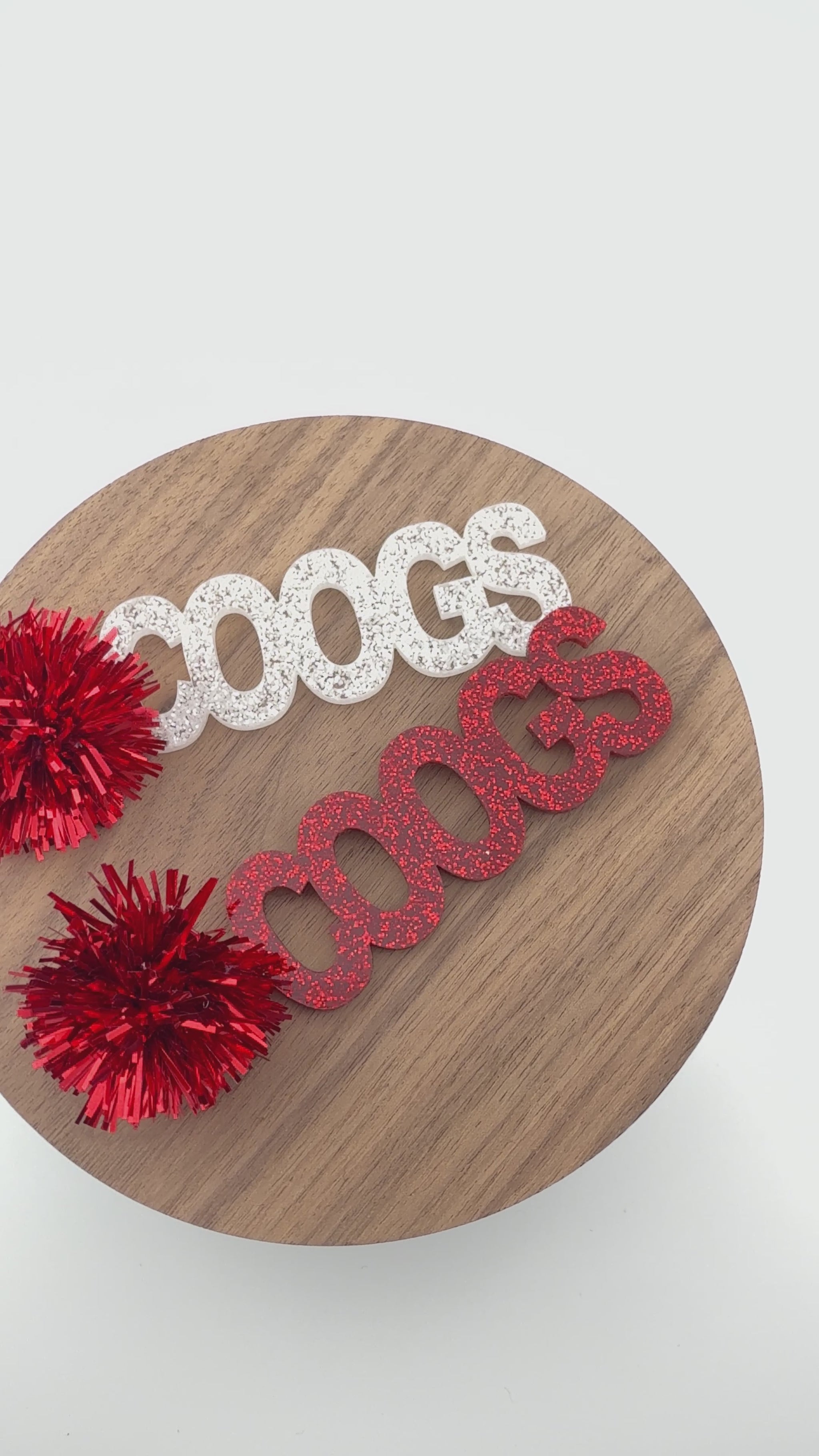 Video of University of Houston COOGs earrings with red tinsel toppers