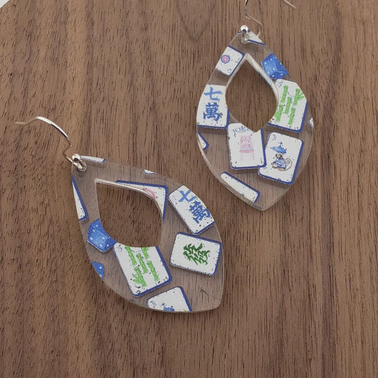 Close up video of Mahjong Acrylic earrings in Teardrop shape by Half Turn Designs.
