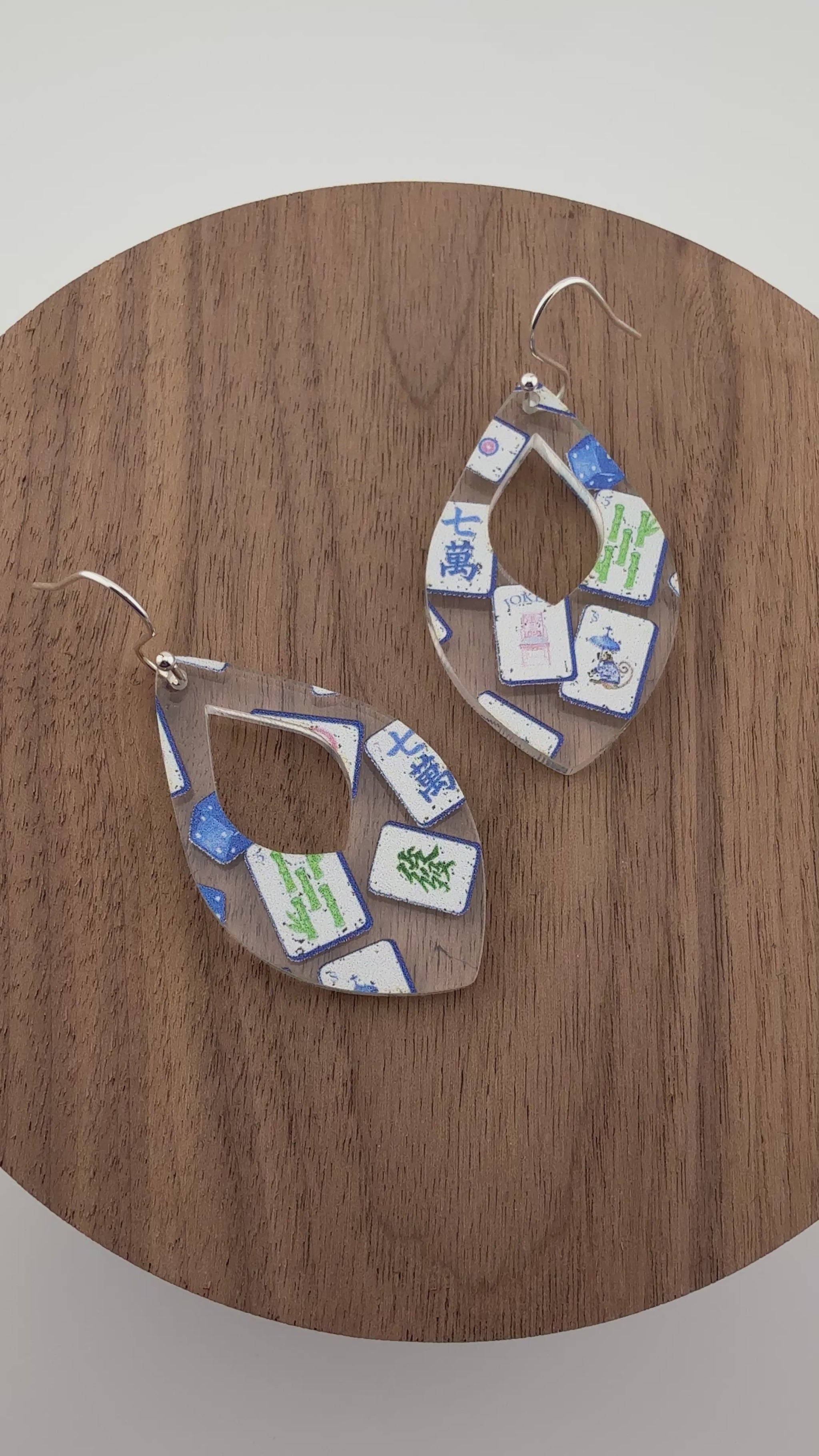Close up video of Mahjong Acrylic earrings in Teardrop shape by Half Turn Designs.