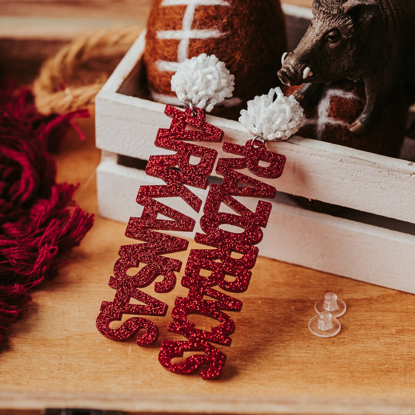 Razorbacks fan jewelry in crimson glitter acrylic with white tube bead toppers