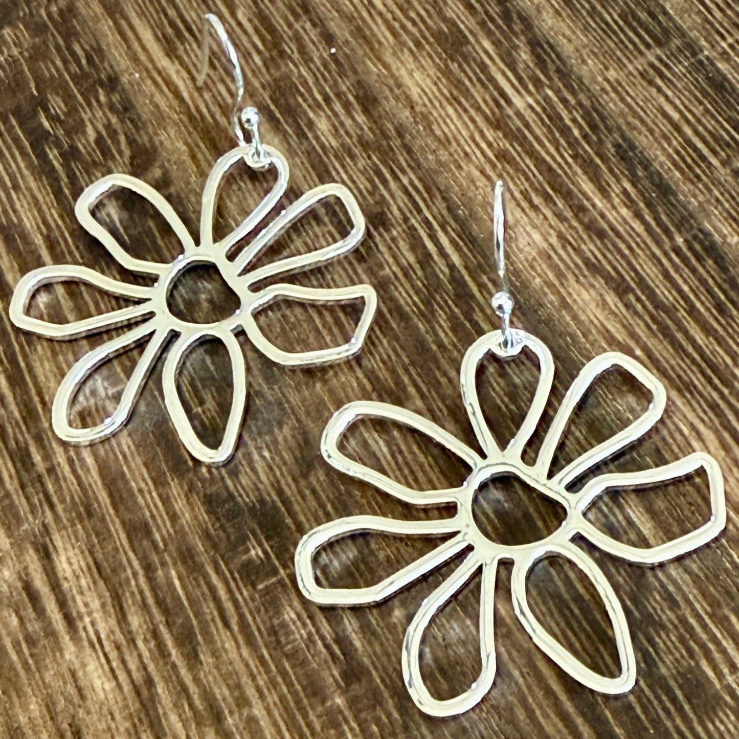 Silver daisy floral statement earrings for spring and summer outfits