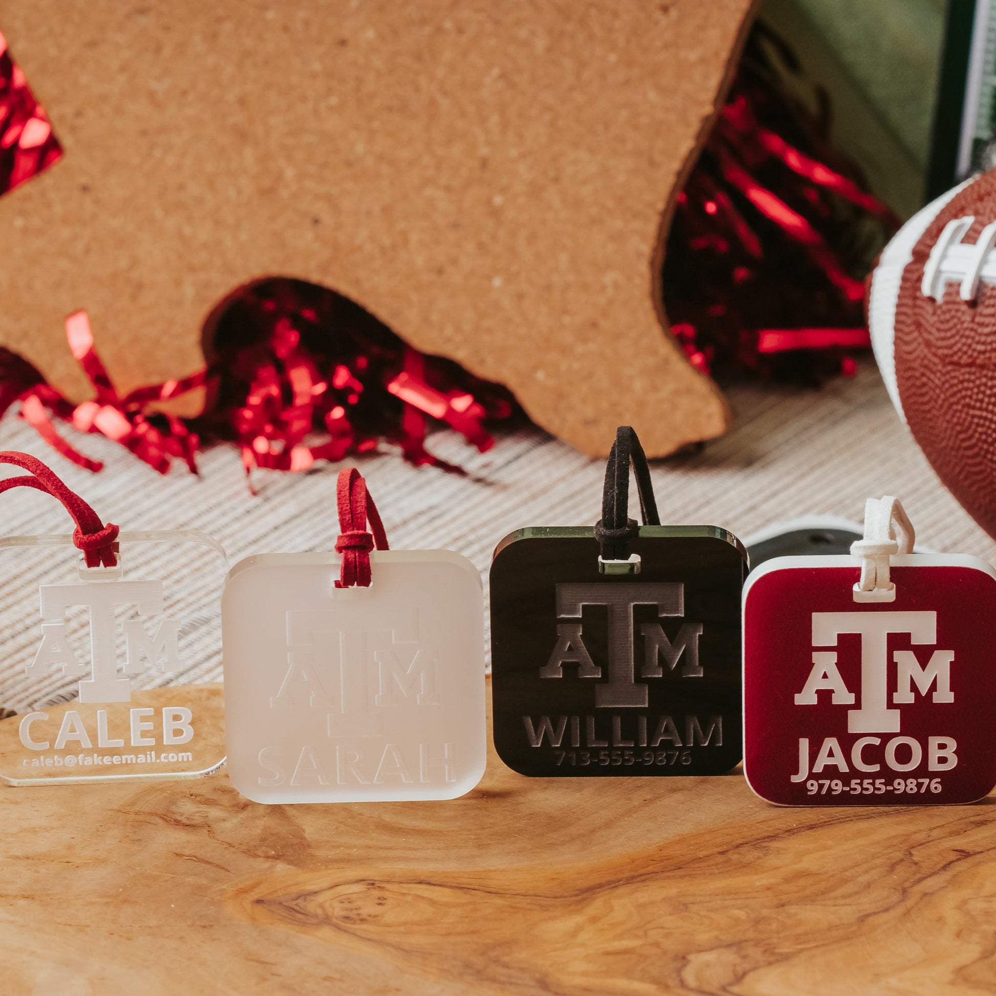 Officially licensed Texas A&M luggage tags in square shape, 2x2".  These acrylic luggage tags are personalized with 1-2 lines of text and come in 1/8" or 1/4" width.  Luggage tag colors include Clear, Frosted, Opaque Black, Shiny Black, Maroon that engraves white and Black that engraves white. 