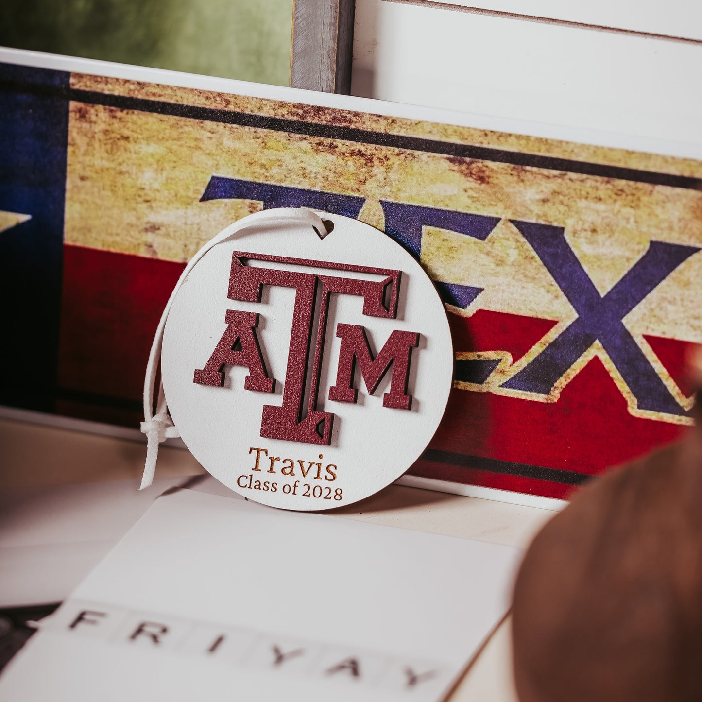 Texas A&M personalized wooden ornament. Available in four wood types - Cherry, Mahogany, Walnut and White wood. Officially licensed by Half Turn Designs.  Shown here in White wood