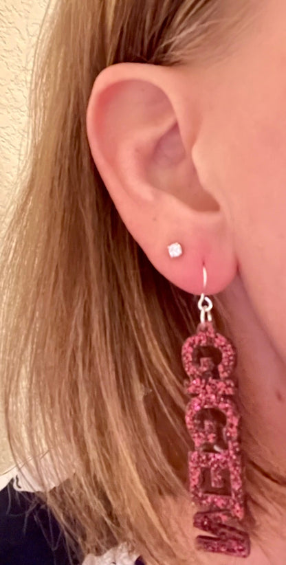 Texas A&M University mini mix & match dangles earrings in maroon and white glitter.  Phrases available include aggies, gig 'em, howdy and whoop