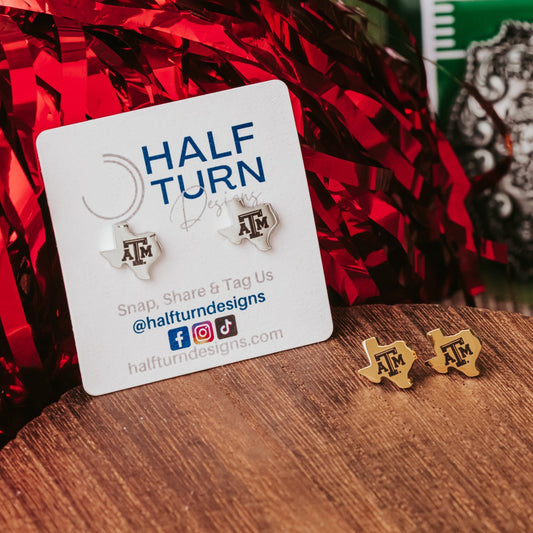 Petite Texas A&M Studs made from stainless steel in gold or silver finish featuring the TAMU logo.