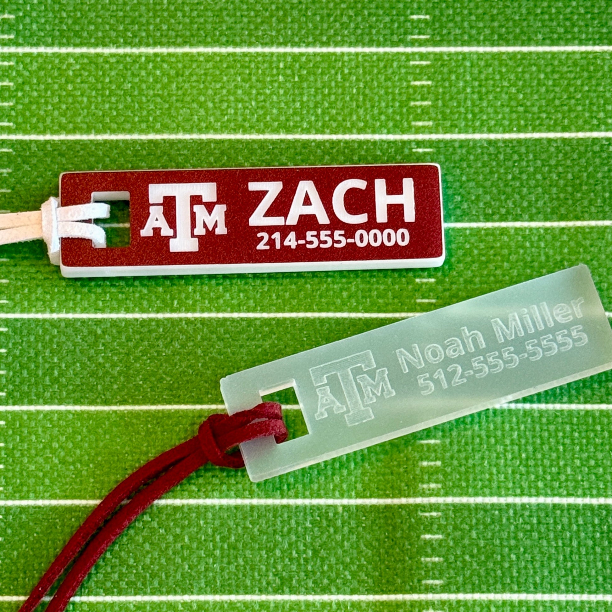 Officially licensed Texas A&M luggage and bag tags in rectangular shape, measuring 2.75x0.75".  These acrylic luggage and bag tags are personalized with 1-2 lines of text and come in 1/8" or 1/4" width.  Luggage tag colors include Clear, Frosted, Opaque Black, Shiny Black, Maroon that engraves white and Black that engraves white.  Frosted and Maroon that engraves White options shown here