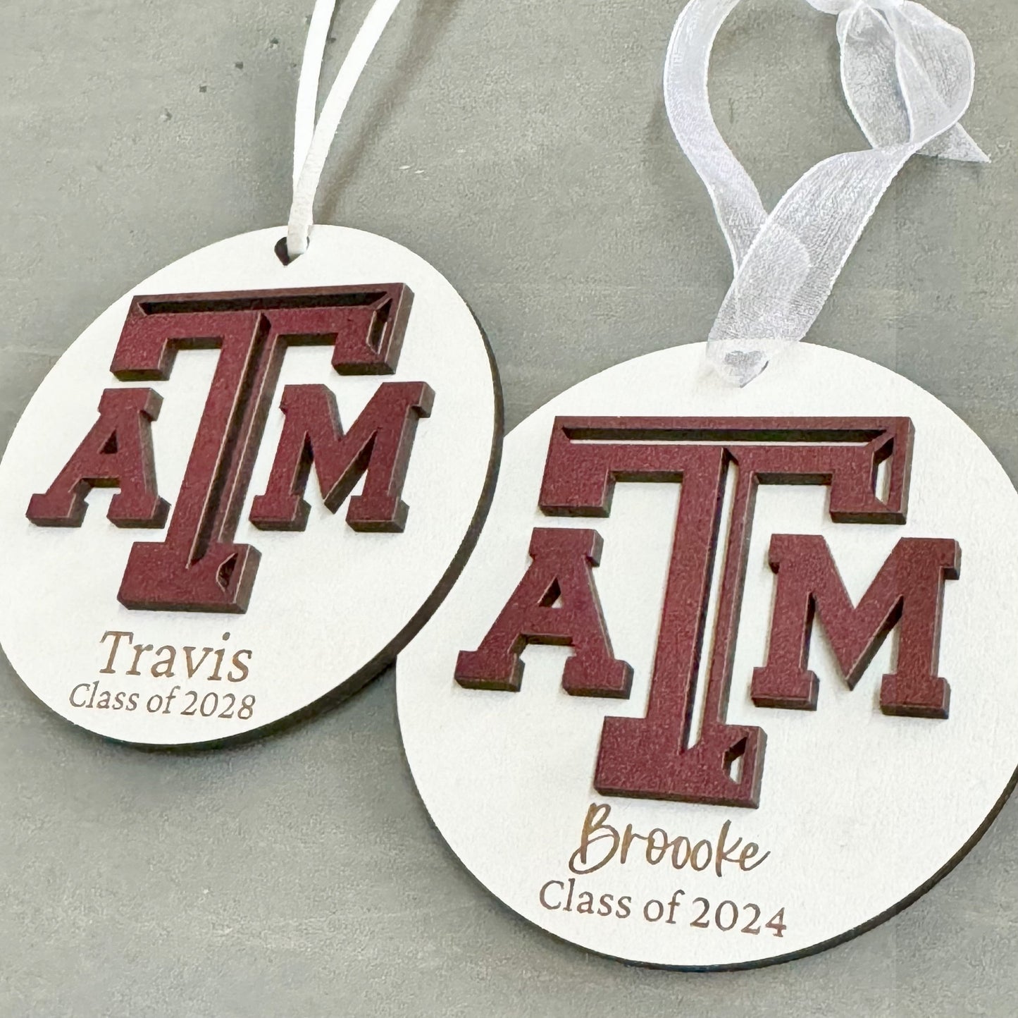 Texas A&M personalized wooden ornament. Available in four wood types - Cherry, Mahogany, Walnut and White wood. Officially licensed by Half Turn Designs.