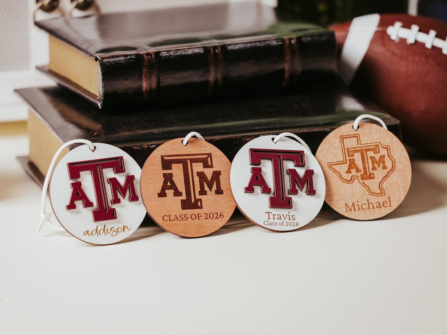 Texas A&M personalized wooden ornament. Available in four wood types - Cherry, Mahogany, Walnut and White wood. Officially licensed by Half Turn Designs.