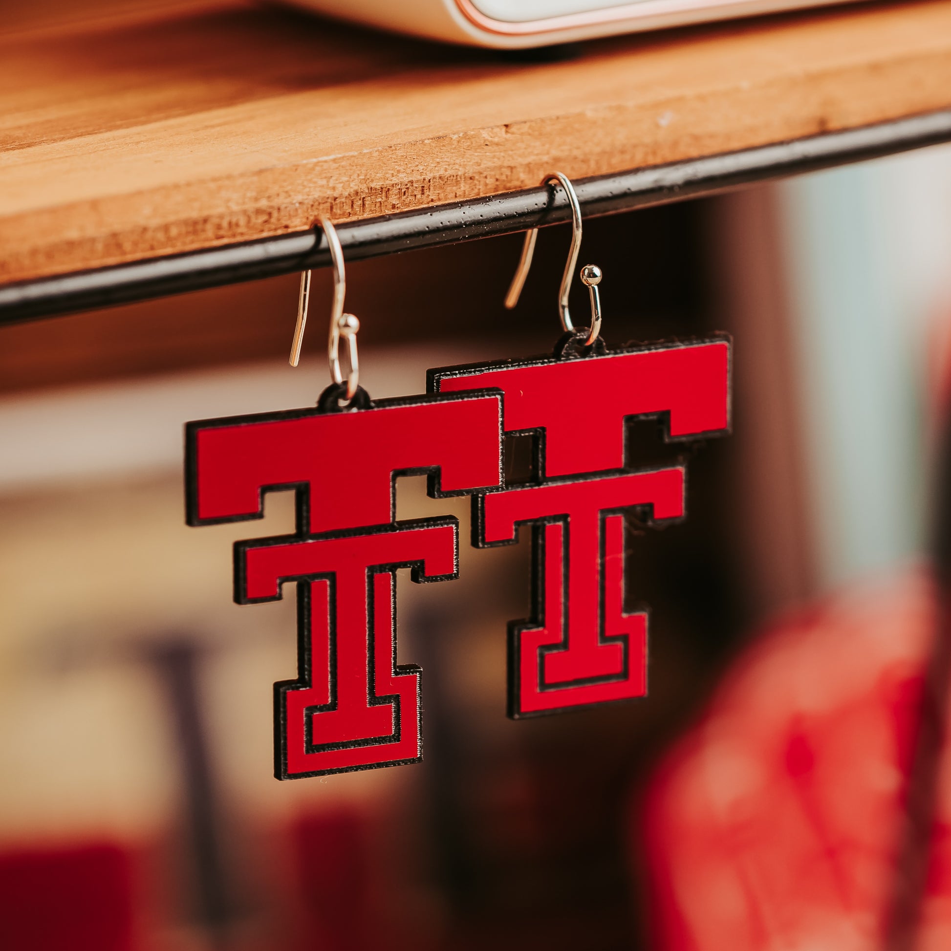 Official Licensed Texas Tech logo acrylic dangle earrings in red and black with hypoallergenic stainless steel earrings hooks in silver