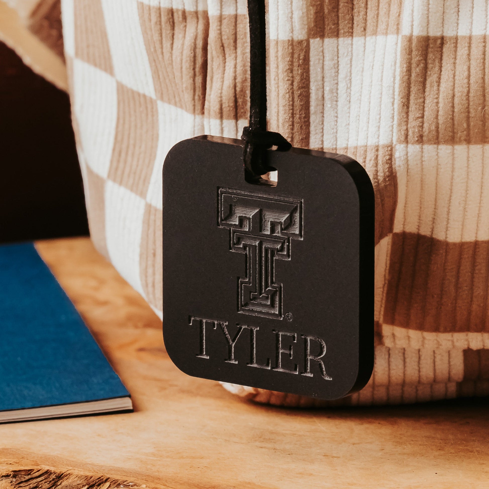 Officially Licensed Texas Tech University luggage tags featuring the TTU logo, personalized with customer's choice of 1-3 lines of information. Available in Clear, Frosted and Opaque Black acrylic by Half Turn Designs.  Shown here in opaque black acrylic.