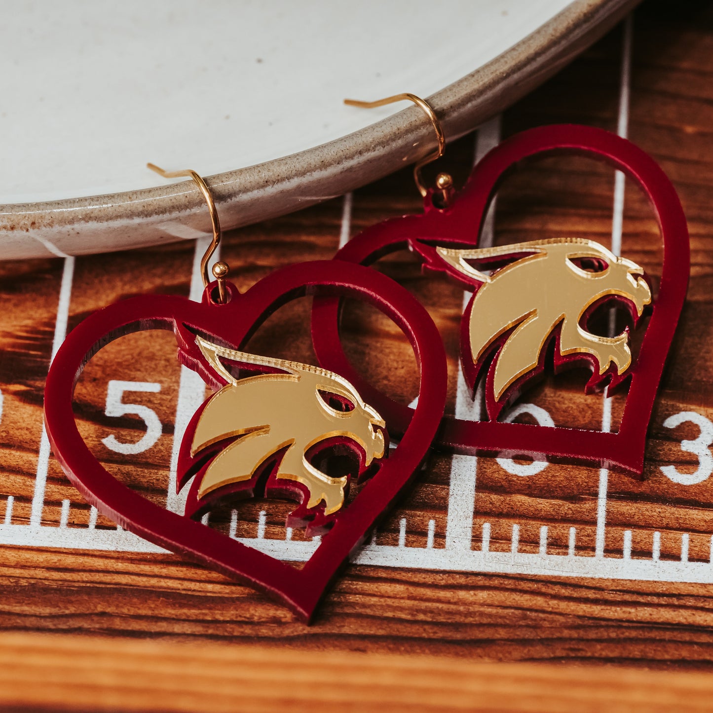 TXST Game Day Bobcats Earrings in Maroon & Gold Acrylic with hypoallergenic stainless steel gold-toned earring hooks by Half Turn Designs