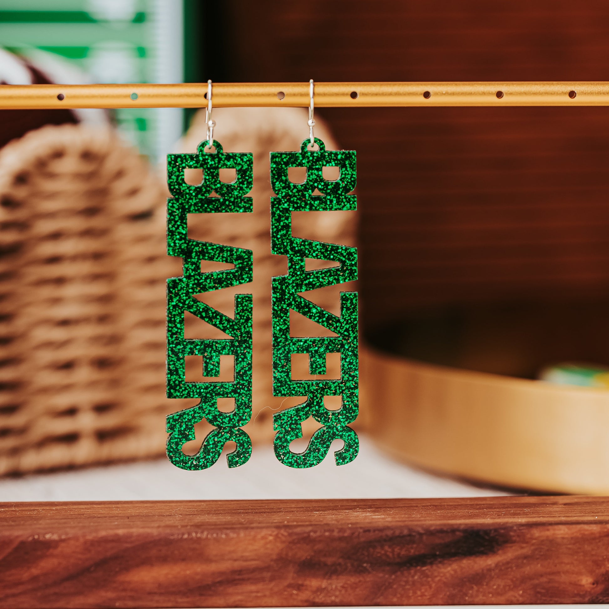 Officially Licensed University of Alabama Birmingham game day earrings in green and white glitter in your choice of 10 different earrings toppers by Half Turn Designs. Shown here with silver earring hooks