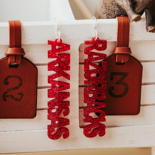 University of Arkansas Razorbacks word earrings in crimson glitter acrylic, officially licensed and handmade by Half Turn Designs