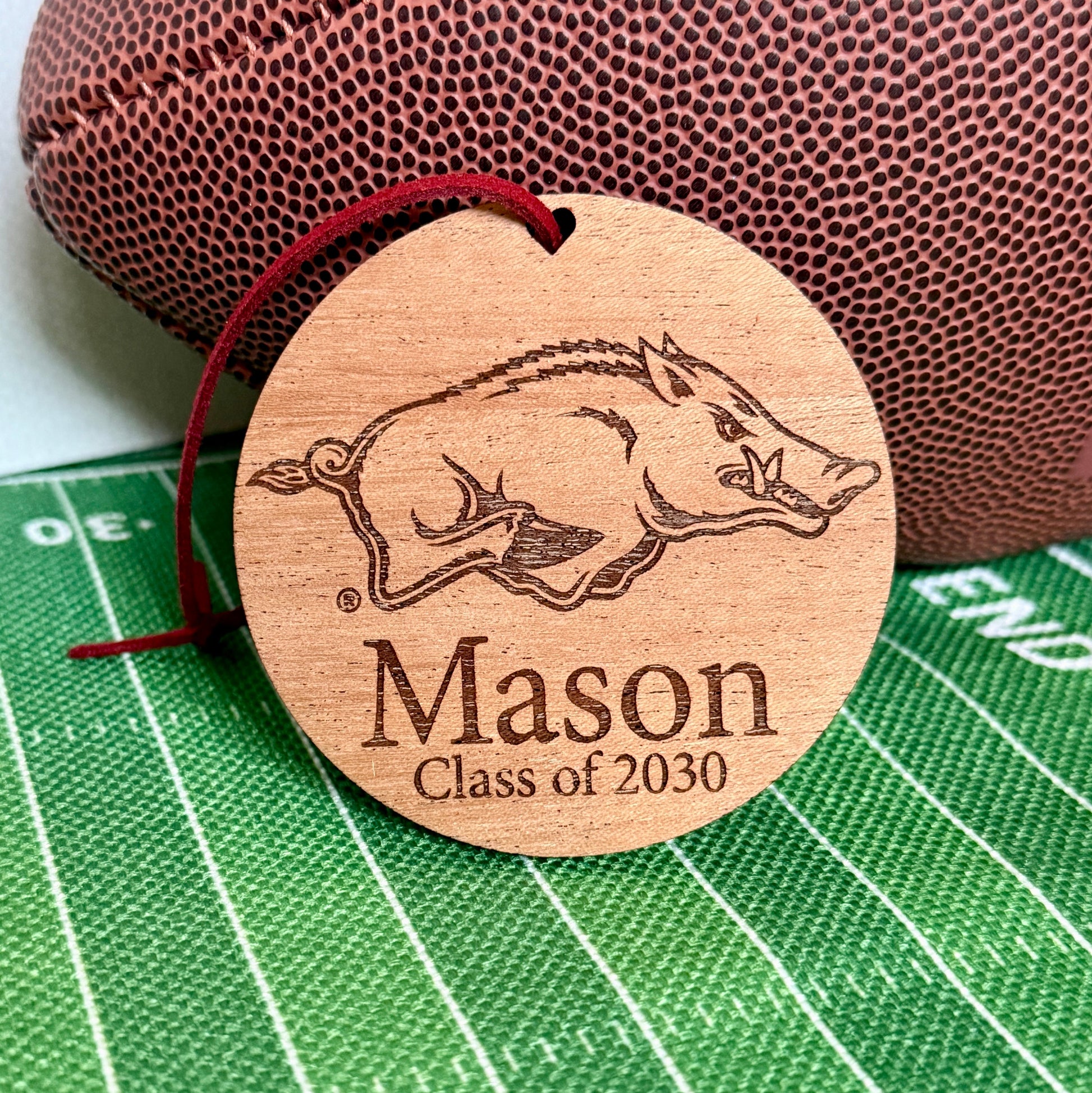 University of Arkansas Razorbacks ornament with UArk  Razorbacks engraved logo and 1-2 lines of personalization. Available in four wood finishes - cherry, mahogany, walnut and white