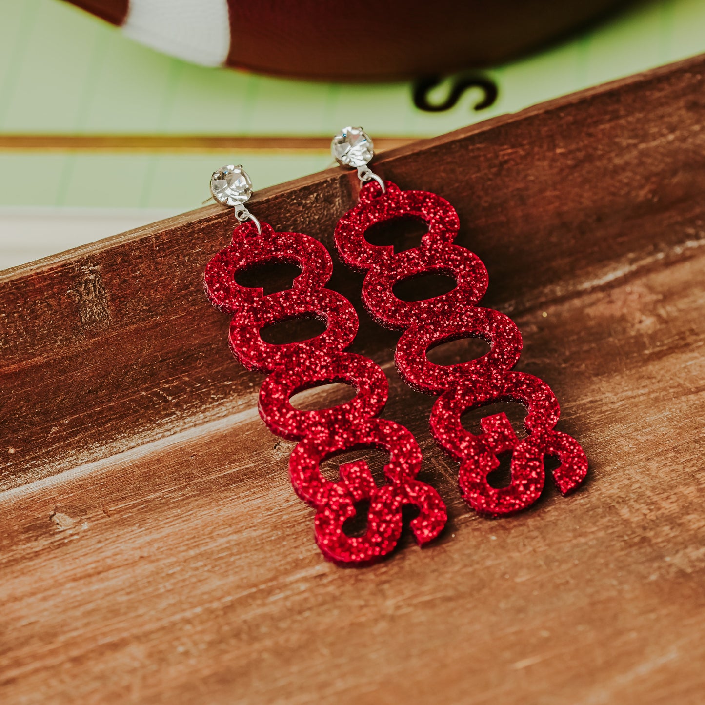 University of Houston COOGS earrings in red and white glitter acrylic with rhinestone studs by Half Turn Designs
