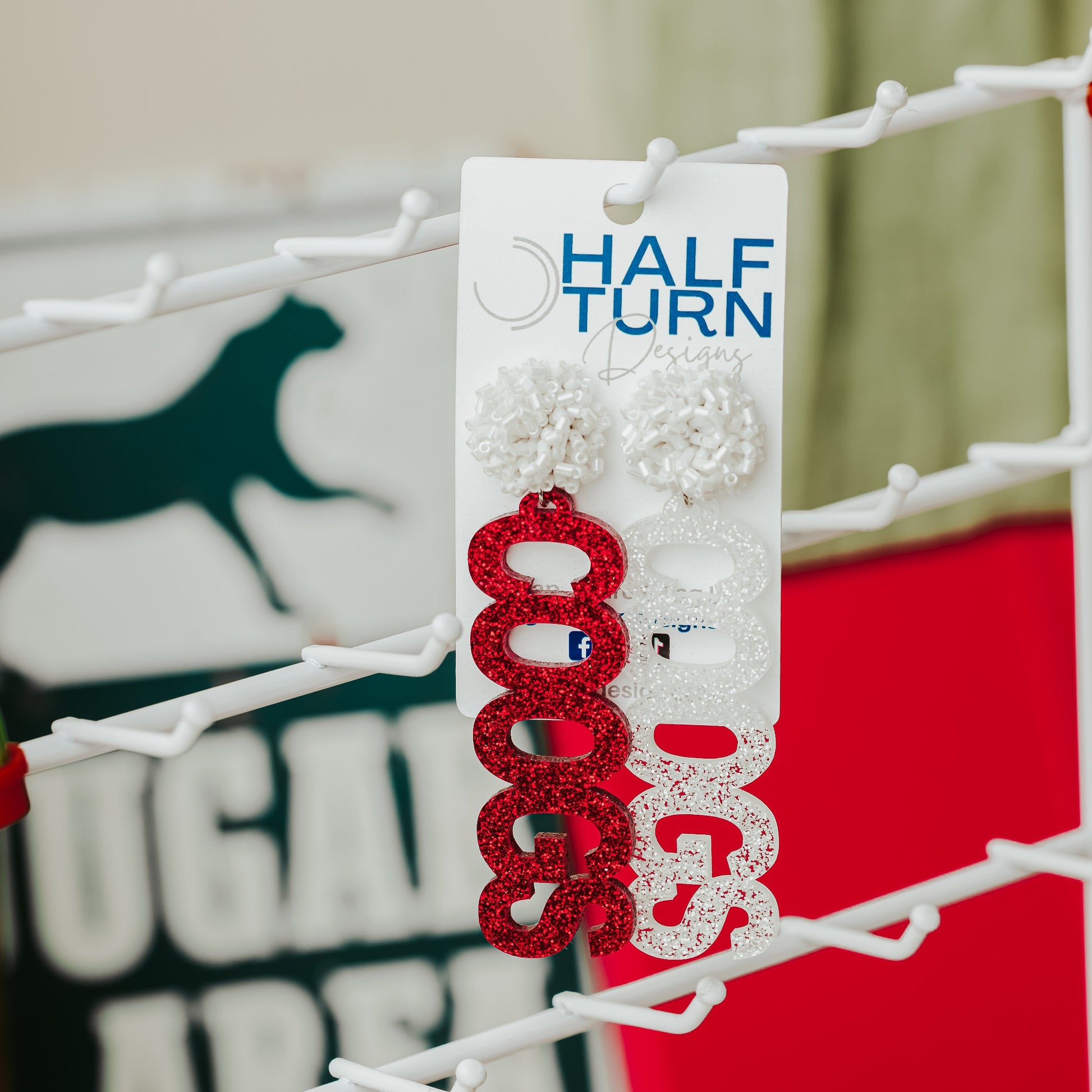 University of Houston COOGS earrings in red and white glitter acrylic with white beaded earring topper by Half Turn Designs