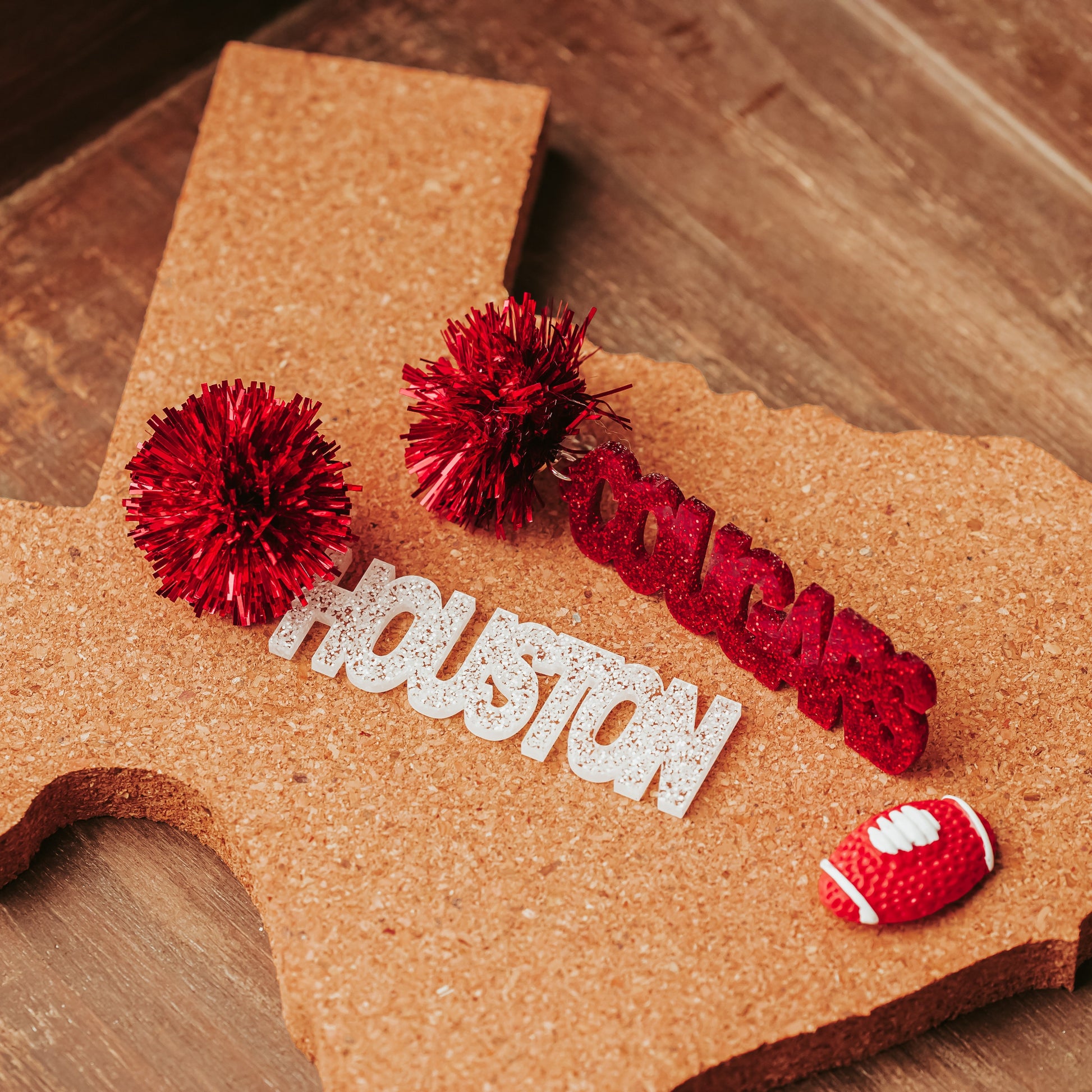 Officially Licensed University of Houston Cougars acrylic dangle earrings in red and white glitter with tinsel  earring topper by Half Turn Designs.