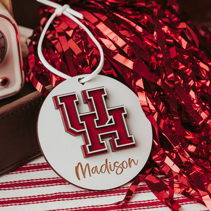 Officially licensed University of Houston personalized ornament by Half Turn Designs in white wood finish with red and white UH logo.
