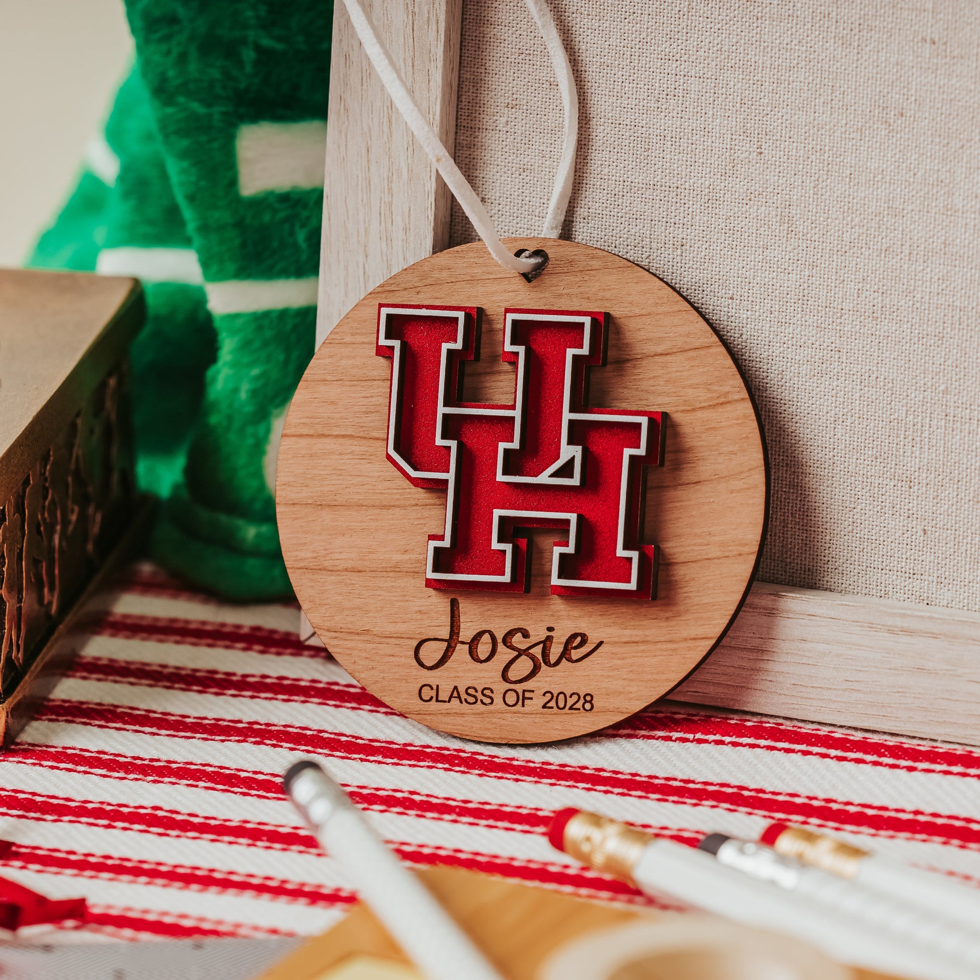 Officially licensed University of Houston personalized ornament by Half Turn Designs in cherry wood finish with red and white UH logo.
