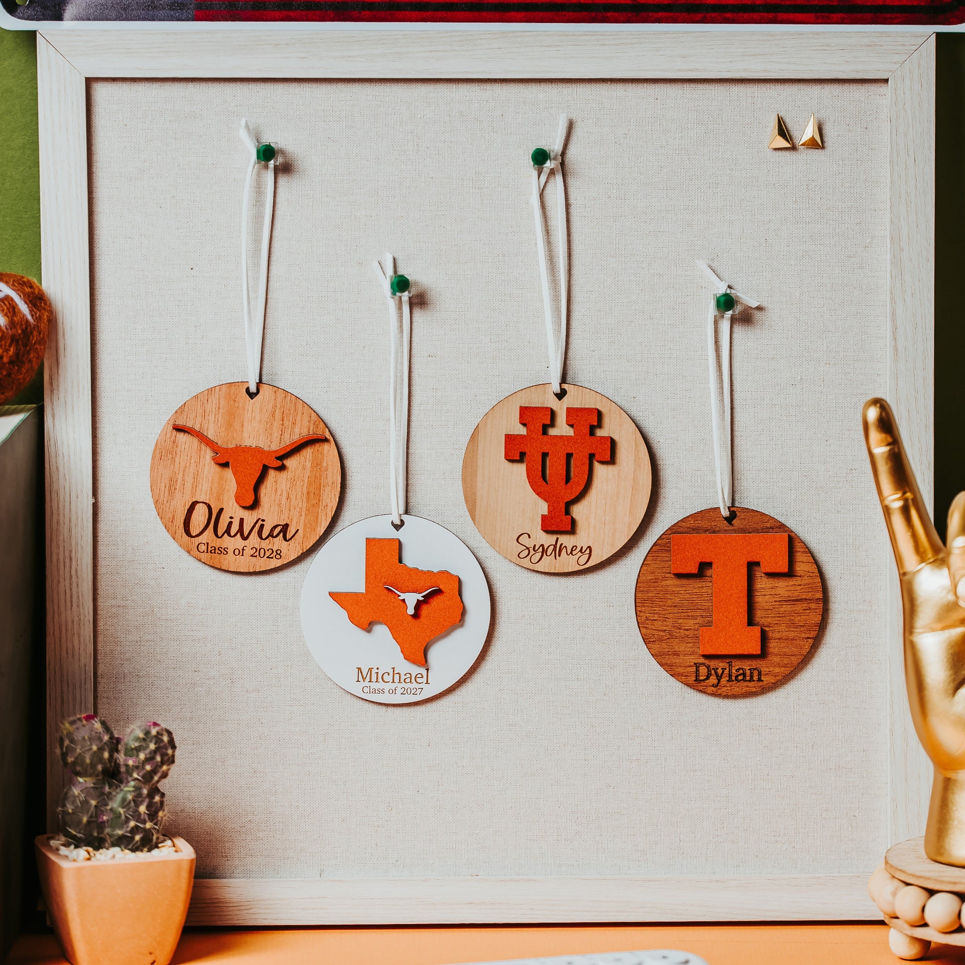 Officially licensed university of texas longhorns personalized ornaments available in four designs and five wood types including white, walnut, cherry, sapele and mahogany.