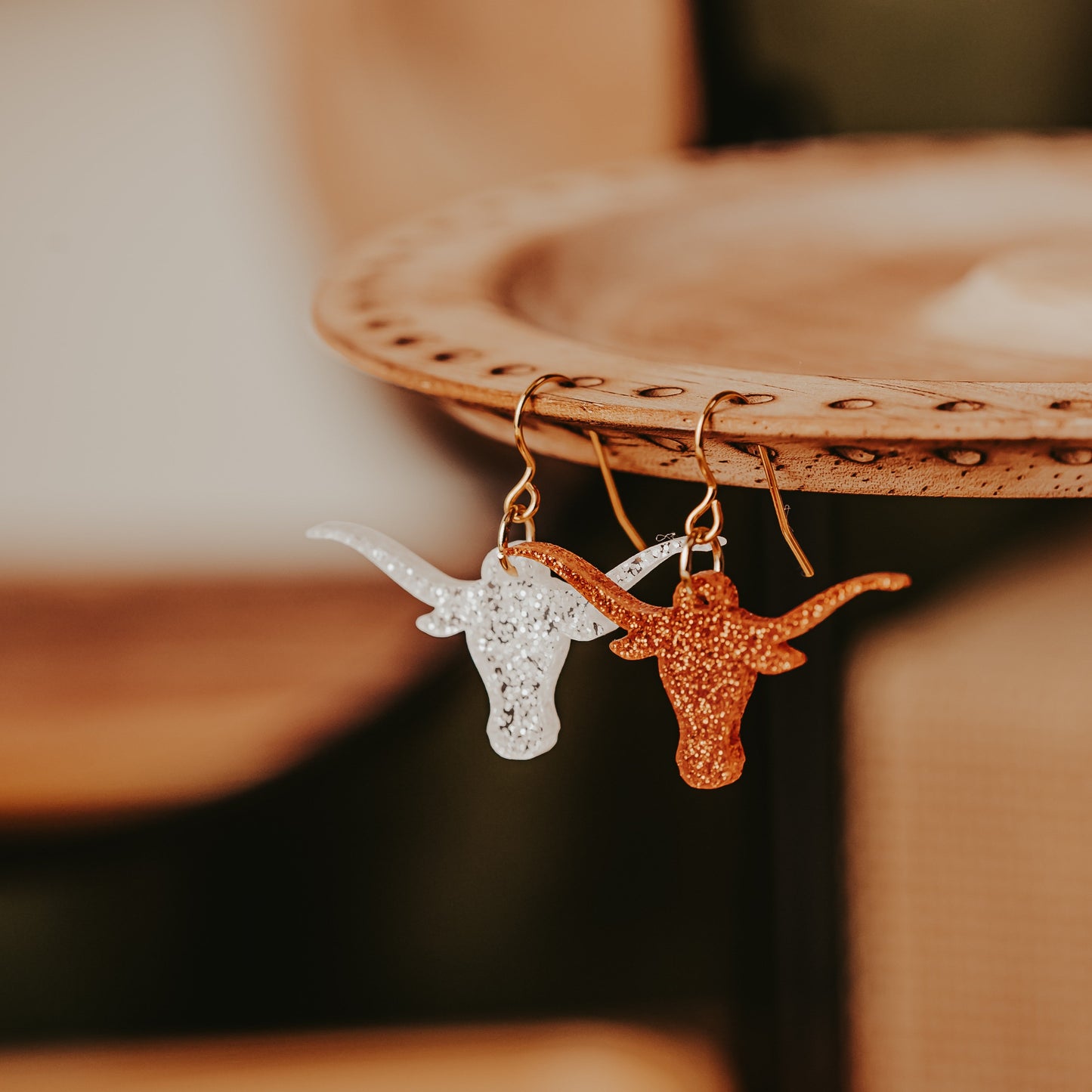 UT Austin burnt orange and white glitter Longhorn dangle earrings