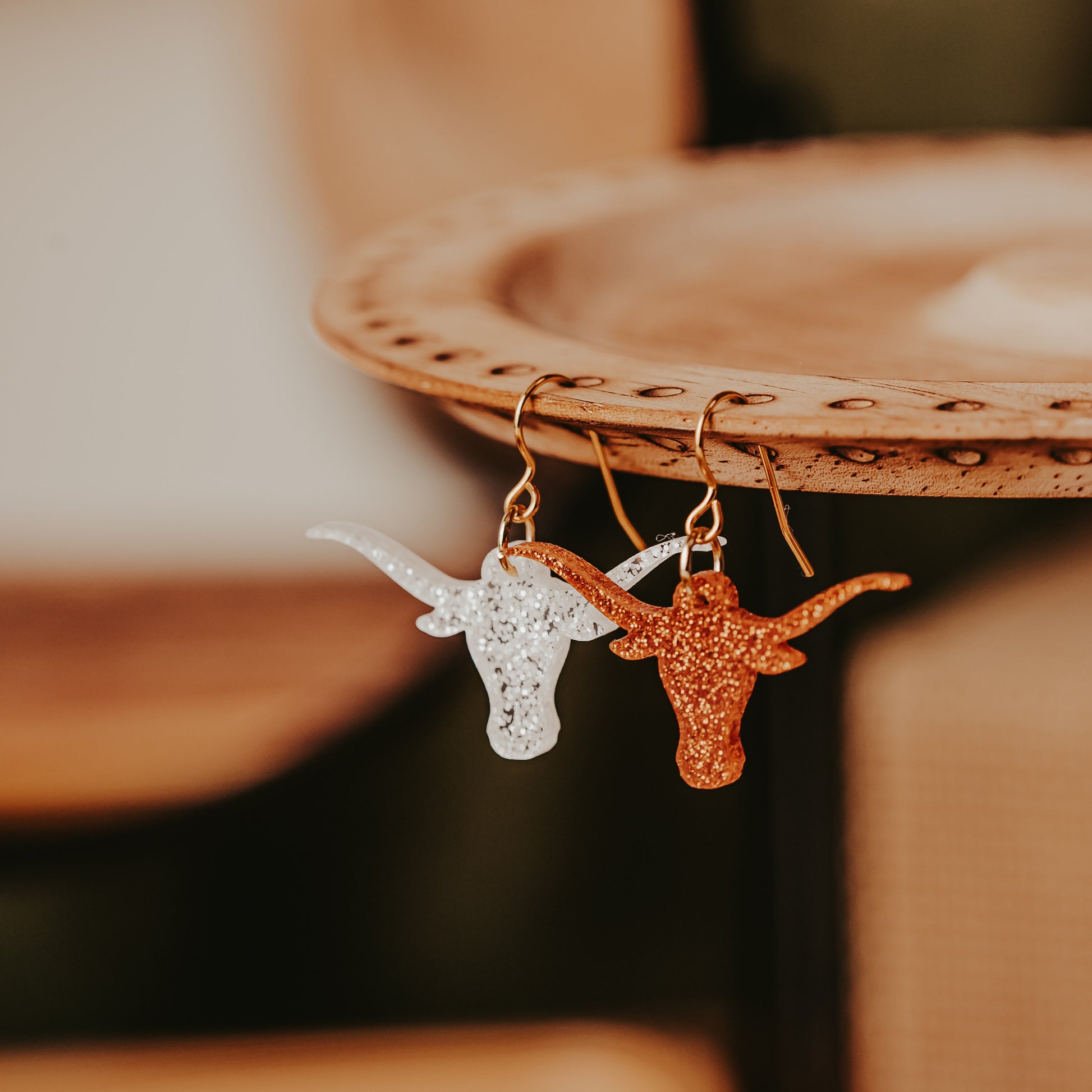 UT Austin burnt orange and white glitter Longhorn dangle earrings